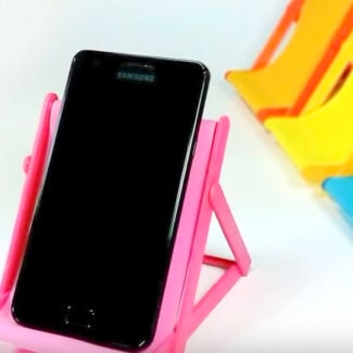 Diy phone holder “lawn chair”…from popsicle sticks